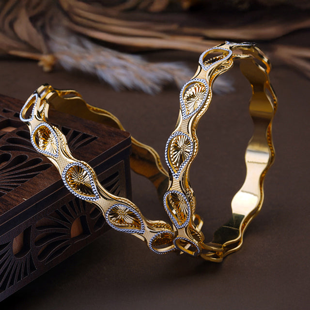 The MoreePork Women's 24 Carat Gold-Plated, Brass Minimalist Masterpiece Bangle Set for Daily Wear, Parties, & Weddings.
